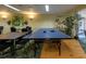 Community game room with a ping pong table, lounge furniture, and bright walls at 3680 Ironwood Cir # 603L, Bradenton, FL 34209