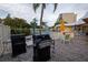 Outdoor grilling area with stainless steel grill and outdoor tables for entertaining at this residence at 3680 Ironwood Cir # 603L, Bradenton, FL 34209
