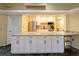 Clubhouse kitchenette featuring stainless steel appliances, ample counter space, and custom cabinets at 3680 Ironwood Cir # 603L, Bradenton, FL 34209