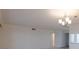 Bright living room with crown moulding and updated lighting at 3680 Ironwood Cir # 603L, Bradenton, FL 34209