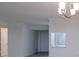 Living room features fresh paint, neutral flooring and a pass through to the kitchen at 3680 Ironwood Cir # 603L, Bradenton, FL 34209