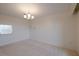 Bright living room with a chandelier and neutral carpet at 3680 Ironwood Cir # 603L, Bradenton, FL 34209