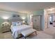 Spacious main bedroom with updated furniture and decor at 3680 Ironwood Cir # 603L, Bradenton, FL 34209