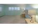 The bedroom offers shuttered windows, lamps on either side of the bed, and neutral carpet at 3680 Ironwood Cir # 603L, Bradenton, FL 34209