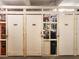 Interior storage units with numbered doors, providing convenient and secure space for residents at 3680 Ironwood Cir # 603L, Bradenton, FL 34209