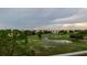 Breathtaking view of the lush golf course and community from the screened balcony at 3680 Ironwood Cir # 603L, Bradenton, FL 34209