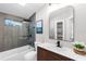 Modern bathroom with stylish vanity, tiled shower, and contemporary fixtures at 4041 Linwood St, Sarasota, FL 34232