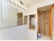 Bathroom with large mirror, unfinished wall and flooring at 500 Park S Blvd # 97, Venice, FL 34285