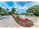 Aldea Mar community sign on lush landscaped entrance at 500 Park S Blvd # 97, Venice, FL 34285