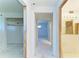 Hallway showing doorways to other rooms and an overhead light at 500 Park S Blvd # 97, Venice, FL 34285