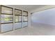 Bright room with a unique windowed division and neutral paint at 500 Park S Blvd # 97, Venice, FL 34285
