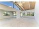 Bright and spacious living room with vaulted ceilings and large windows at 500 Park S Blvd # 97, Venice, FL 34285