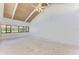 Spacious living room boasting vaulted ceilings and large windows with outdoor views at 500 Park S Blvd # 97, Venice, FL 34285