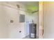 Functional utility room with water heater, shelf and electrical panel, ready for upgrades at 500 Park S Blvd # 97, Venice, FL 34285