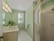 Classic bathroom with a shower, vanity, and ample natural light at 5012 Cherry Laurel Way, Sarasota, FL 34241