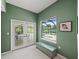 Enclosed room with a view of the pool area, offering relaxation and style at 5012 Cherry Laurel Way, Sarasota, FL 34241