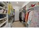 Walk-in closet with ample shelving, hanging space, and efficient storage solutions at 5012 Cherry Laurel Way, Sarasota, FL 34241