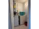 Efficient laundry area with washer, dryer, water heater and storage at 5026 Water Oak Dr # 114, Bradenton, FL 34207