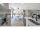Bright and modern kitchen open to the dining area, featuring stainless steel appliances at 5032 Barcelona Ave, Sarasota, FL 34235