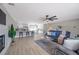 Open floor plan with modern kitchen, light-filled dining area, and a cozy living space at 5032 Barcelona Ave, Sarasota, FL 34235