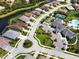 Aerial view of a single-Gathering home with a pool in a gated community near a lake at 5533 Long Shore Loop, Sarasota, FL 34238