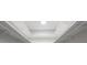 Walk-in closet with upper shelving for maximum storage capacity at 5533 Long Shore Loop, Sarasota, FL 34238