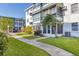 Attractive condo exterior with lush landscaping and private patios at 5891 Welcome Rd # I6, Bradenton, FL 34207