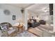 Cozy porch area with wicker furniture leading into a living room with comfortable seating at 5891 Welcome Rd # I6, Bradenton, FL 34207