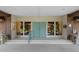 Entrance to the golf shop with double doors and surrounding windows at 6061 Fairway Ln # 1411, Bradenton, FL 34210