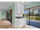 Kitchenette area with custom cabinets and granite counters with views of lanai at 6061 Fairway Ln # 1411, Bradenton, FL 34210