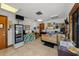 Inviting reception area featuring tiled floors, beverage fridge, and wood-paneled reception desk at 6061 Fairway Ln # 1411, Bradenton, FL 34210