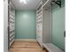 Custom walk-in closet with built-in shelving and ample storage space at 6061 Fairway Ln # 1411, Bradenton, FL 34210