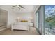 Bedroom with queen bed and balcony access at 626 Rawls Ave # 626, Sarasota, FL 34236