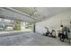 Spacious two-car garage with workout equipment and ample storage space for vehicles and gear at 626 Rawls Ave # 626, Sarasota, FL 34236