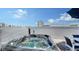Relax in the rooftop hot tub with stunning city views, complemented by stylish outdoor seating at 626 Rawls Ave # 626, Sarasota, FL 34236