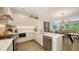 Modern kitchen with stainless steel appliances and stylish cabinetry at 626 Rawls Ave # 626, Sarasota, FL 34236