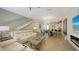Spacious living room with modern staircase, and open layout at 626 Rawls Ave # 626, Sarasota, FL 34236