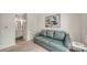 Modern office room featuring a sofa and a view into the bathroom at 626 Rawls Ave # 626, Sarasota, FL 34236