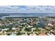 Expansive waterfront home with boat access, showcasing serene views and a luxurious pool in a beautiful community at 670 Old Compass Rd, Longboat Key, FL 34228