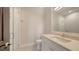 Modern bathroom features glass shower, vanity with solid surface counters, and tile floor at 670 Old Compass Rd, Longboat Key, FL 34228
