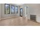Bright bonus room features a mini-bar and convenient access to the outdoor living area with palm tree views at 670 Old Compass Rd, Longboat Key, FL 34228