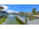 The private dock provides easy access to deep water and boating opportunities at 670 Old Compass Rd, Longboat Key, FL 34228