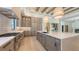 State-of-the-art kitchen with large island, modern appliances, and custom cabinetry at 670 Old Compass Rd, Longboat Key, FL 34228