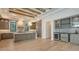Spacious kitchen features a large island, modern cabinetry, and stainless steel appliances at 670 Old Compass Rd, Longboat Key, FL 34228