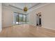 This bright living room is well lit, featuring a pendant ceiling light at 670 Old Compass Rd, Longboat Key, FL 34228