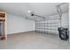 Spacious garage with ample storage space, epoxy floors and an automatic door opener at 7352 Cabin Ln, Sarasota, FL 34240
