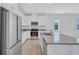Well-equipped kitchen with stainless steel appliances, quartz countertops, and ample cabinet space at 7352 Cabin Ln, Sarasota, FL 34240