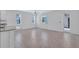 Inviting living area features bright windows, tiled flooring, and a welcoming atmosphere at 7352 Cabin Ln, Sarasota, FL 34240