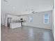 Open-concept living area with large windows, recessed lights, and modern finishes, ideal for gatherings at 7352 Cabin Ln, Sarasota, FL 34240