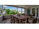 Beautiful covered patio perfect for outdoor dining with a full seating arrangement at 7404 14Th W Ave, Bradenton, FL 34209